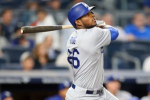 Sep 12, 2016; Bronx, NY, USA; Los Angeles Dodgers right fielder Yasiel Puig (66) hits a solo home run against the New York Yankees during the eighth inning at Yankee Stadium. Mandatory Credit: Brad Penner-USA TODAY Sports